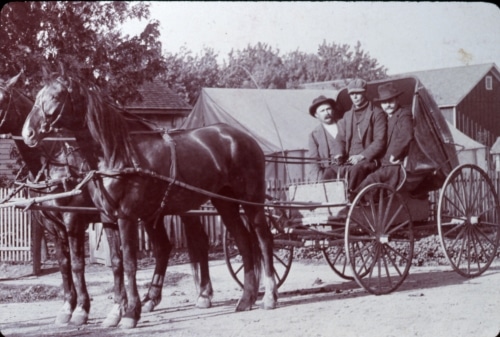 Three Wanatah residents in a horse-drawn buggy
