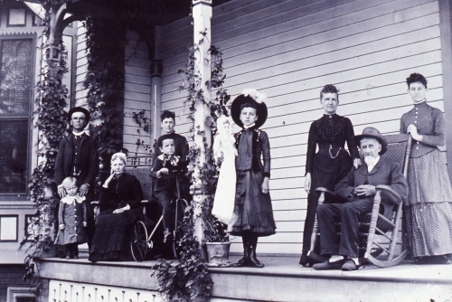 Family photo on porch, early 1900s