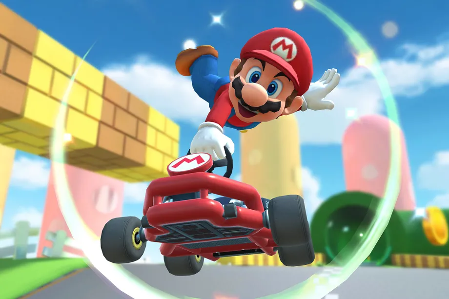 image is of mario flying above a little car