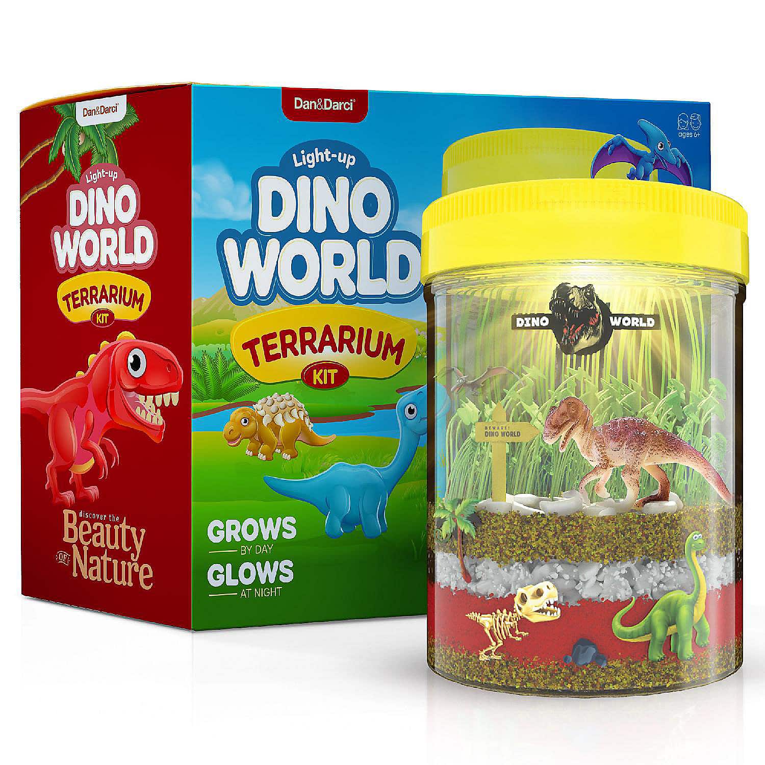 a terrarium with dinosaurs is shown in front of it's corrosponding box