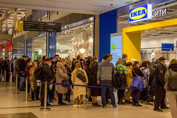 People in line to enter an Ikea store